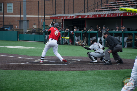 Kevin Biondic hits a leadoff triple in the fourth inning against Army on 2/25/18. Photo by Amanda Broderick/Maryland Baseball Network