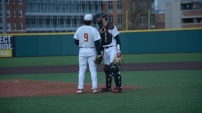 Billy Phillips and Justin Vought discuss their strategy. Photo by Amanda Broderick/Maryland Baseball Network